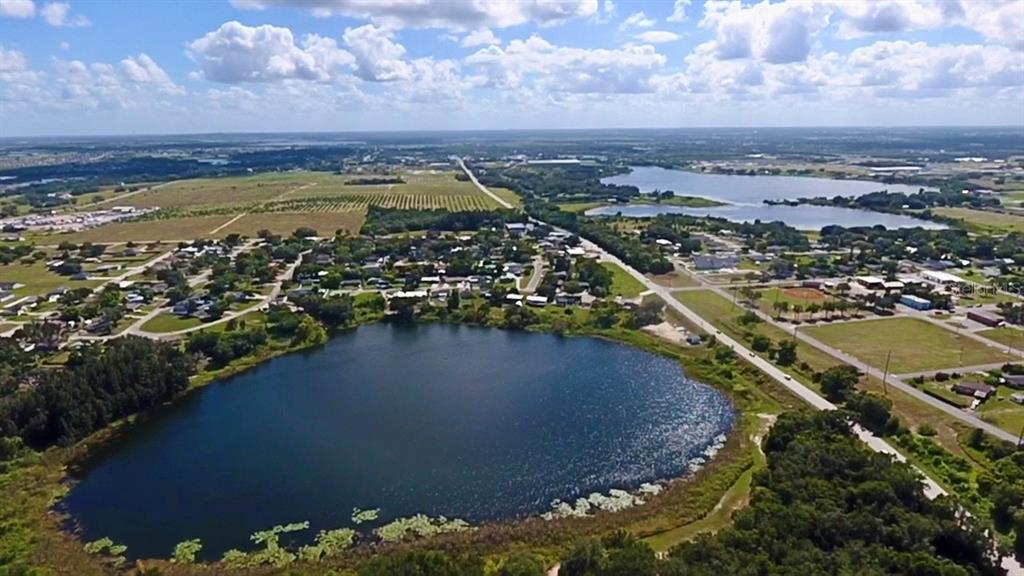 111 Water Tank Road Haines City, FL 33844 - Photo 43 of 48 an aerial view of a residential houses with outdoor space and swimming pool