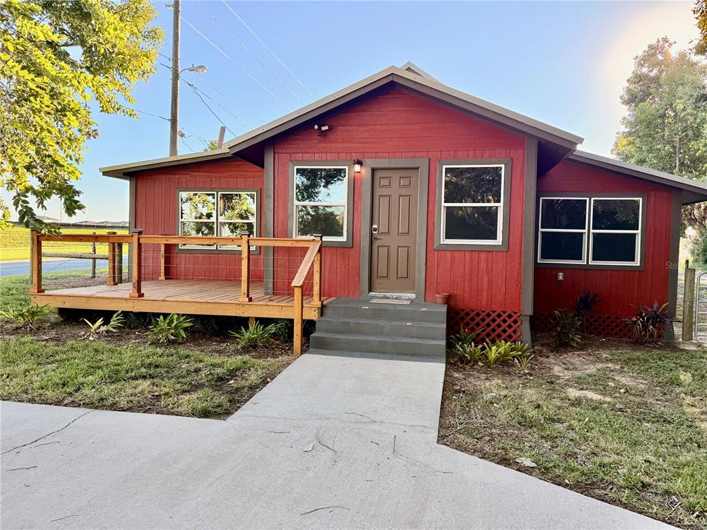 111 Water Tank Road Haines City, FL 33844 - Photo 47 of 48 a front view of a house with garden