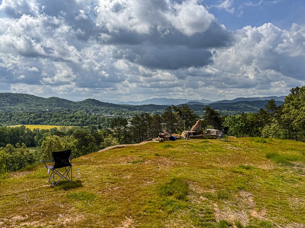134 Mistletoe Ridge Murphy, NC 28906 - Photo 10 of 18 a view of a lake with a yard