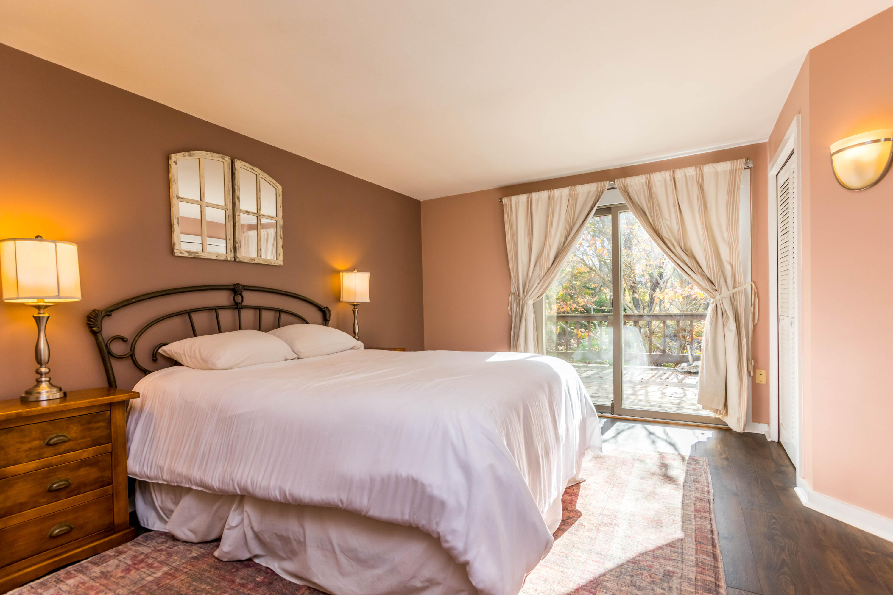 141 Long Pond Road Brewster, MA 02631 - Photo 16 of 58 1st floor main bedroom with slider to de