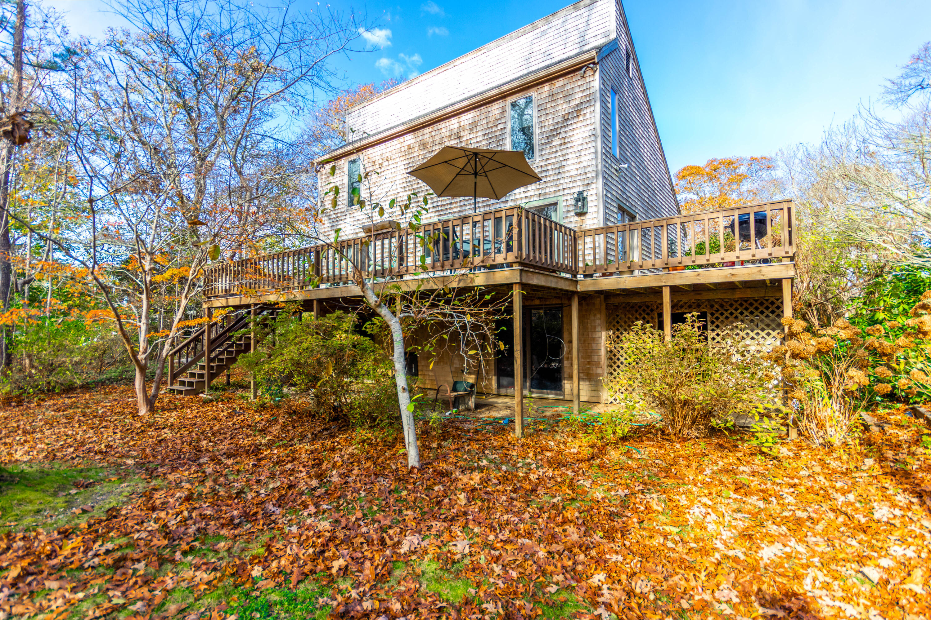 141 Long Pond Road Brewster, MA 02631 - Photo 34 of 58 Wraparound deck & walkout basement