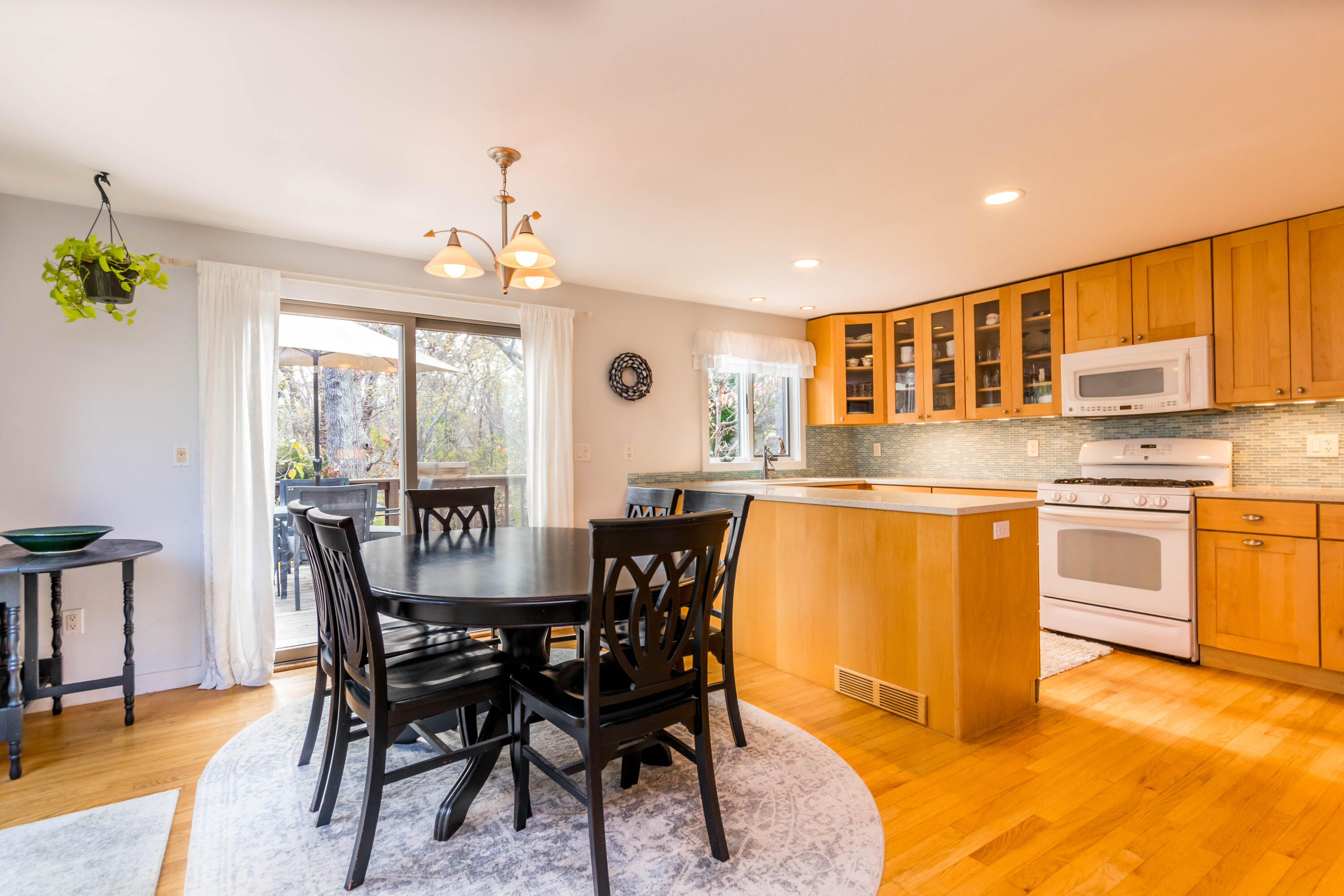 141 Long Pond Road Brewster, MA 02631 - Photo 4 of 58 Kitchen/dining with slider to deck