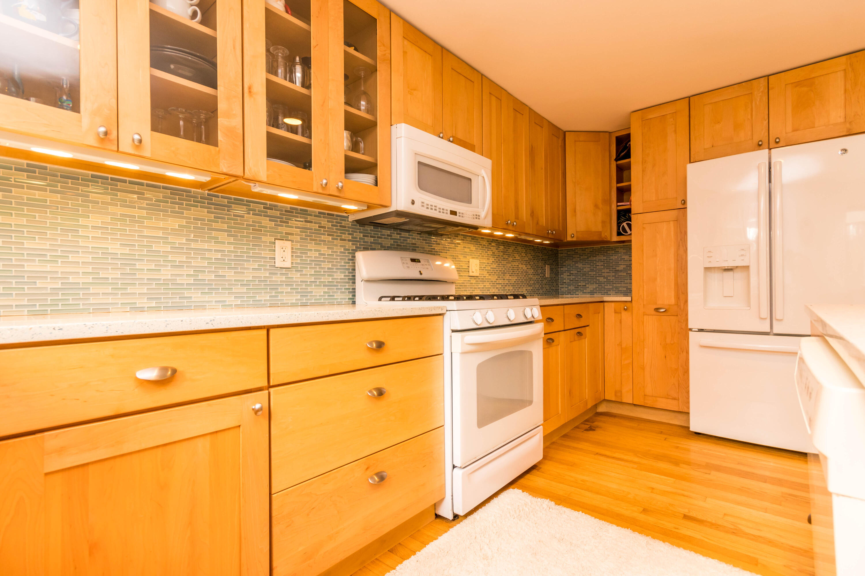 141 Long Pond Road Brewster, MA 02631 - Photo 6 of 58 Custom cabinetry with granite