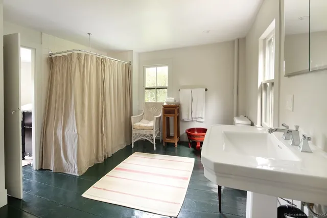 a view of a hallway with a flower pot