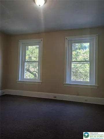 an empty room with a window