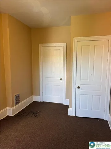 an empty room with closet
