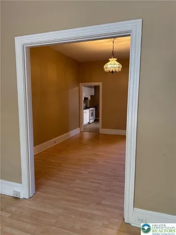a view of a livingroom with wooden floor