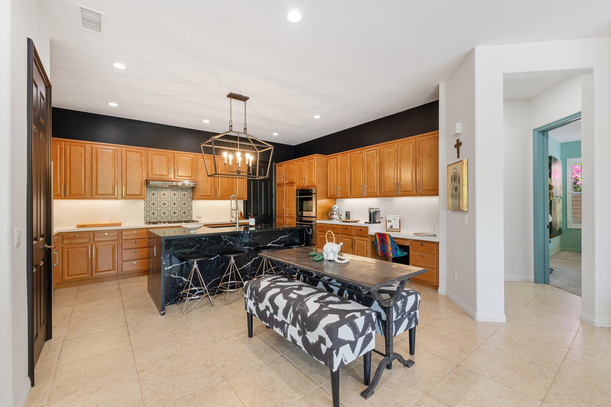 61185 Soaptree Drive La Quinta, CA 92253 - Photo 11 of 51 a room with furniture