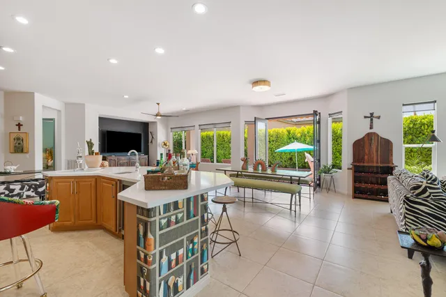 a view of a living room and dining room