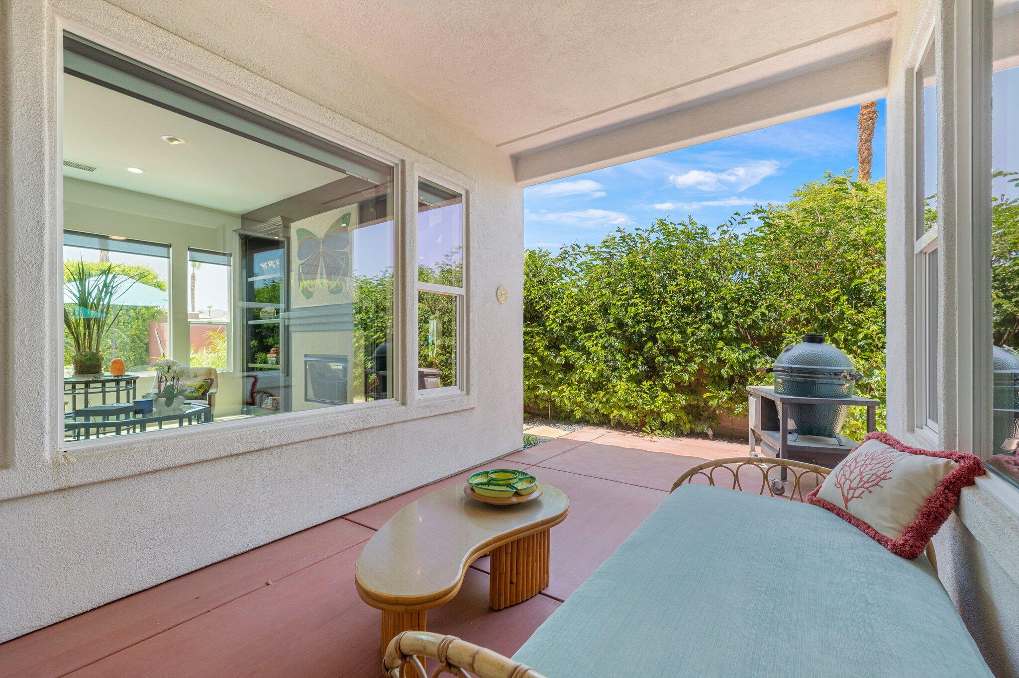 61185 Soaptree Drive La Quinta, CA 92253 - Photo 19 of 51 a living room with furniture and a window