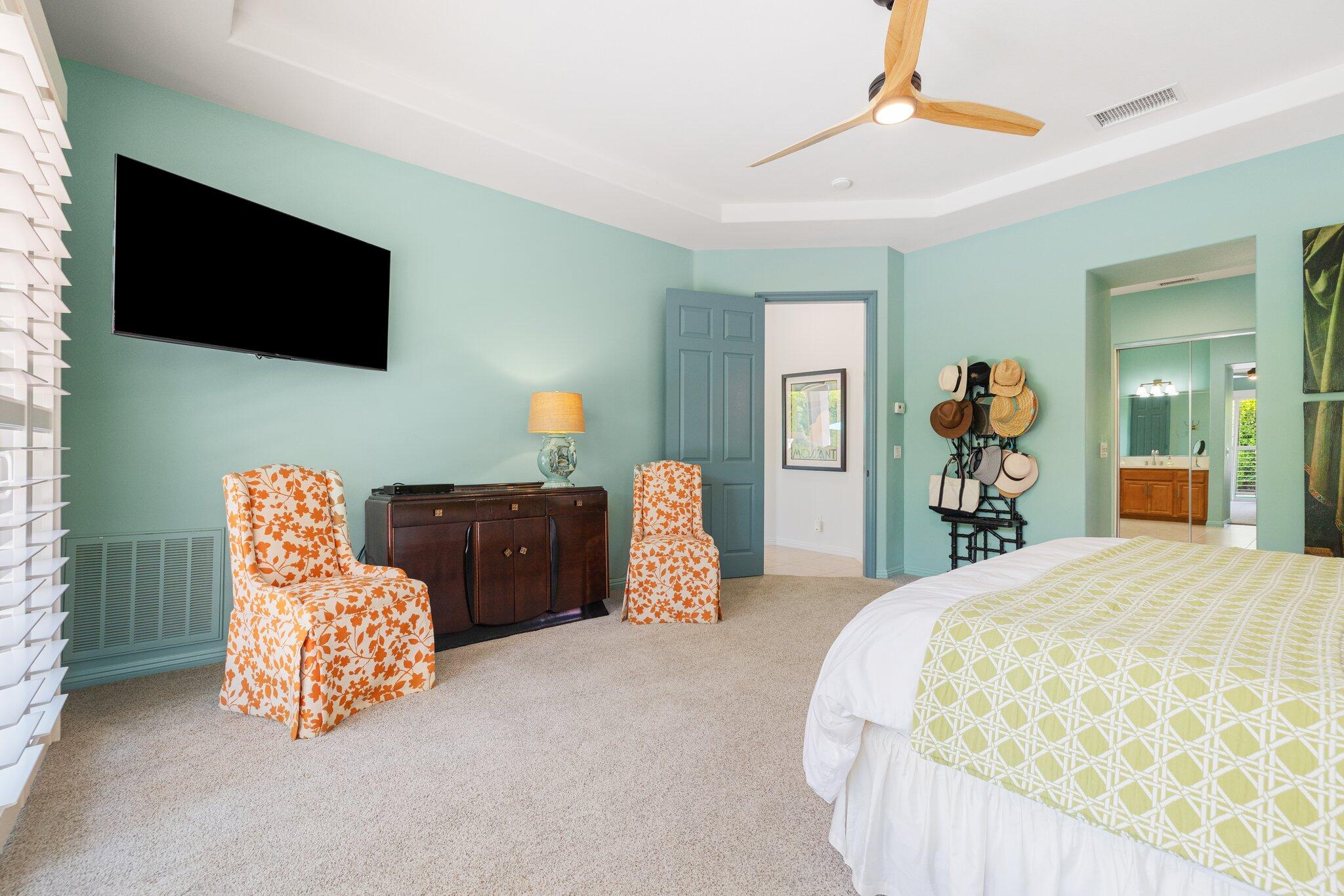 61185 Soaptree Drive La Quinta, CA 92253 - Photo 23 of 51 a bedroom with bed and tv