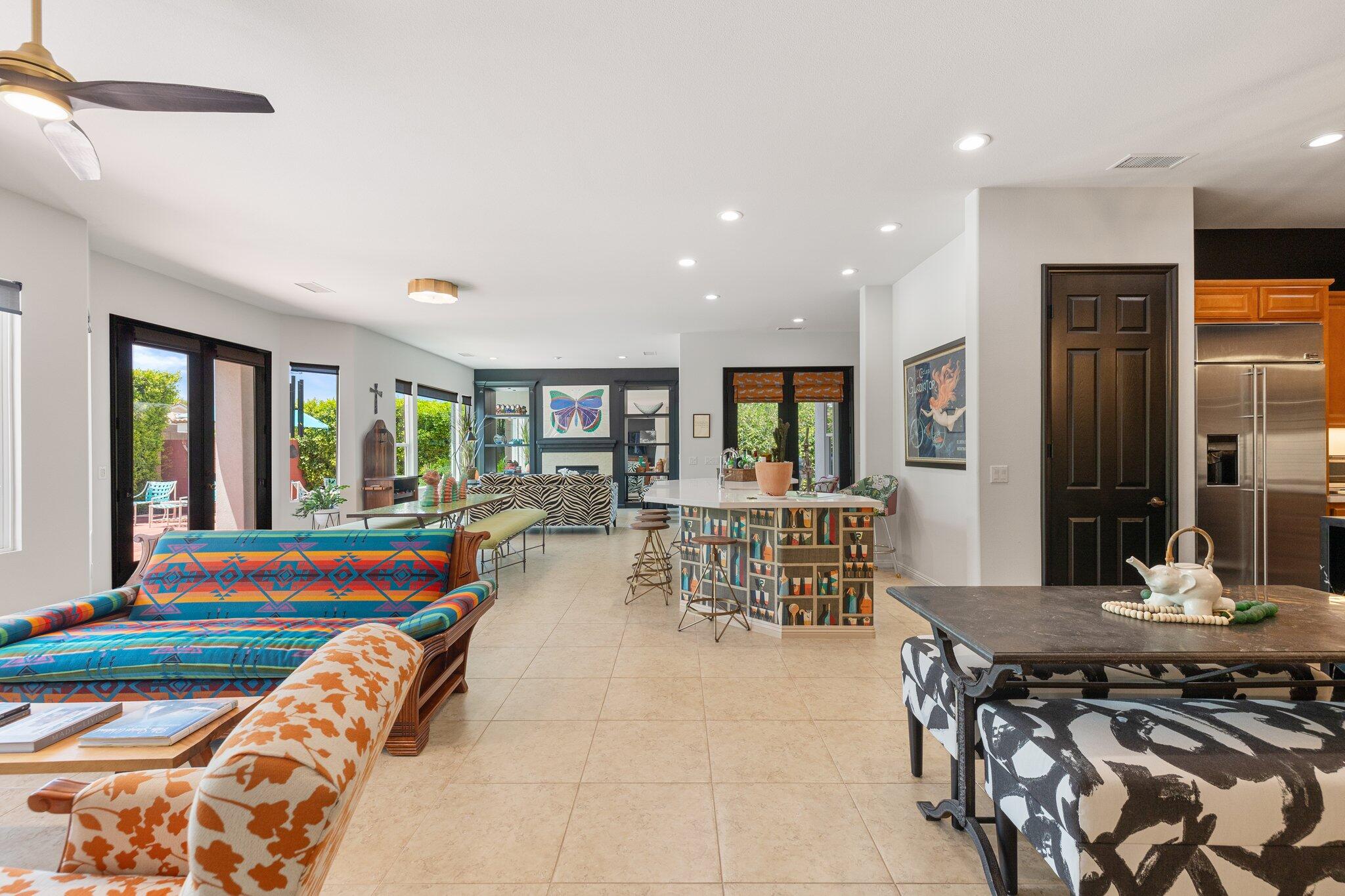 61185 Soaptree Drive La Quinta, CA 92253 - Photo 8 of 51 a very nice looking dining room with a large dining table and chairs
