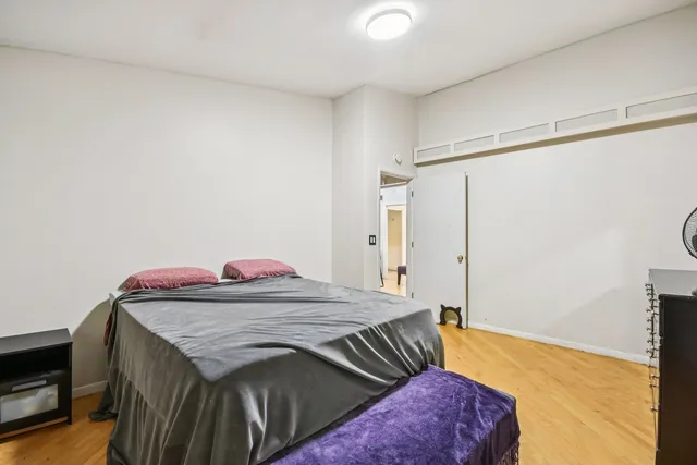 a white toilet sitting next to a bathroom sink
