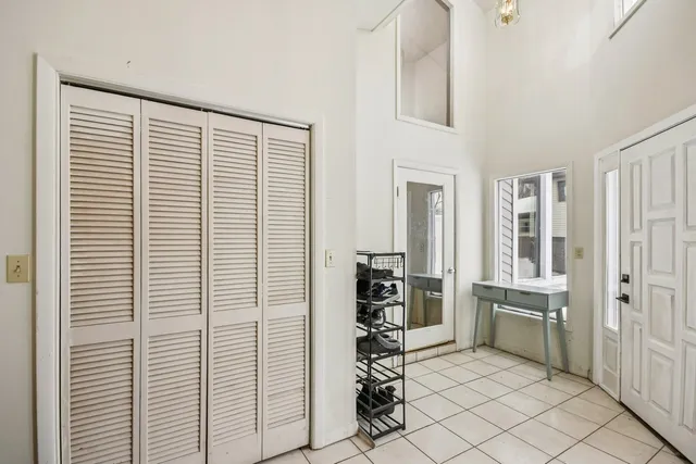 a view of kitchen with furniture and large window