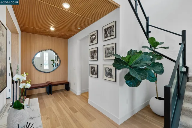 a view of a hallway with seating space