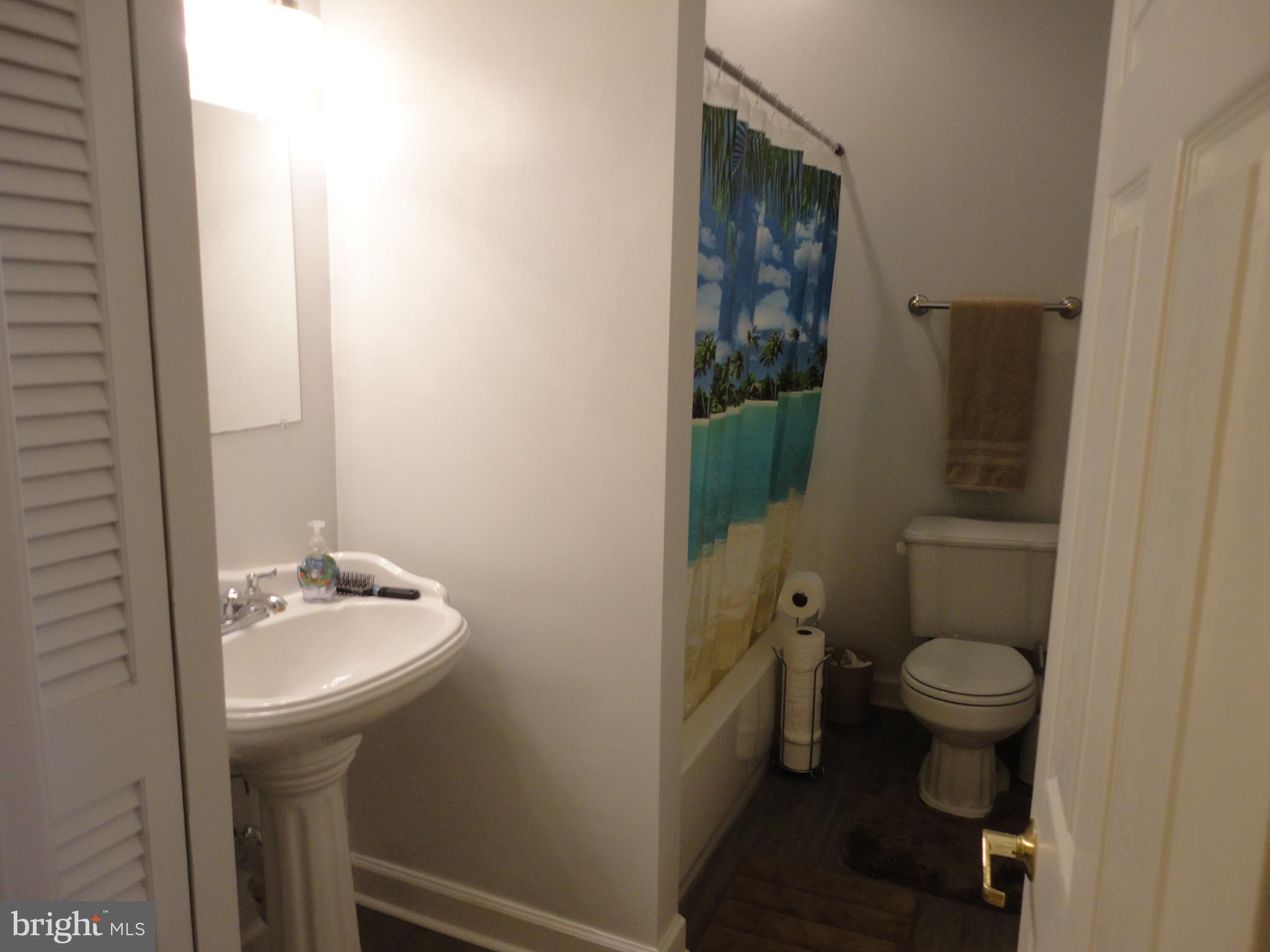 7818 Harbor Road Pasadena, MD 21122 - Photo 21 of 23 Main Bathroom Upper Level
