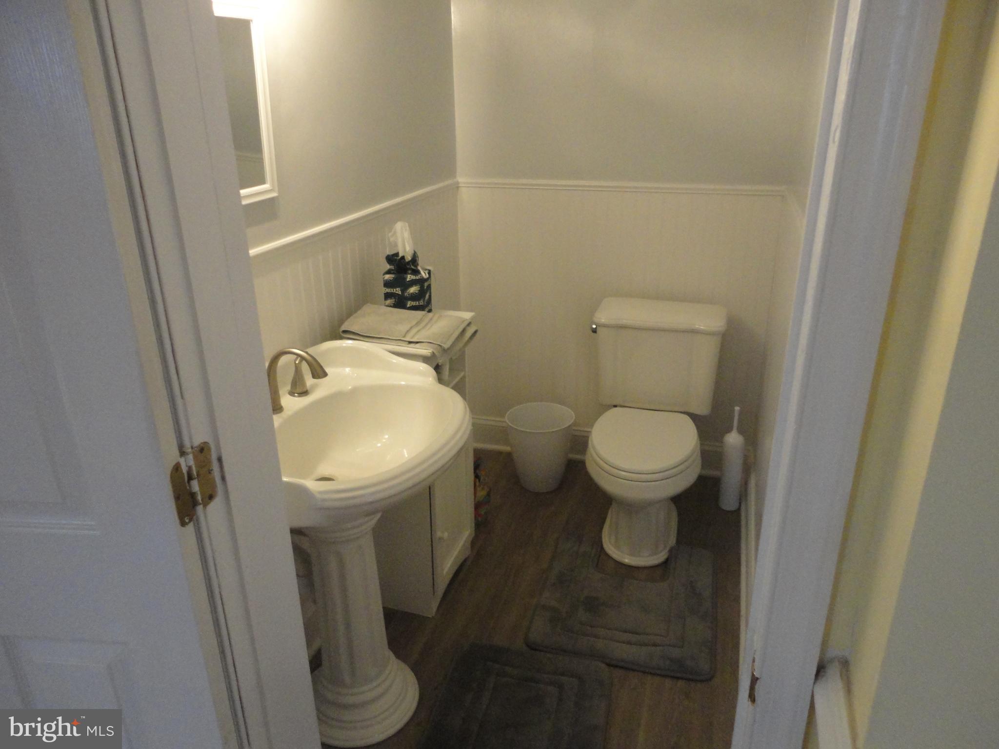 7818 Harbor Road Pasadena, MD 21122 - Photo 7 of 23 Main Level Powder Room