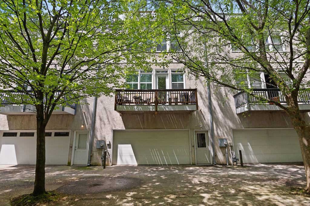 230 Bradberry Street Southwest, Unit 9 Atlanta, GA 30313 - Photo 24 of 36 a front view of a house with a yard