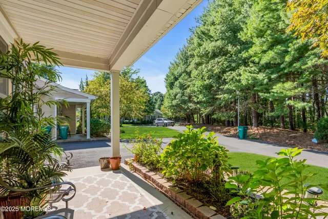 a view of a garden with patio