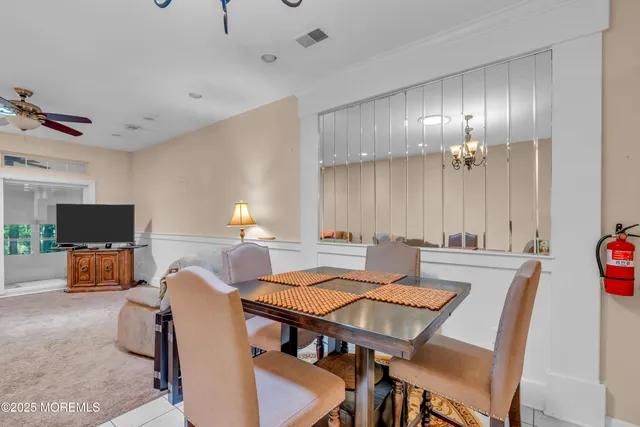 a view of a dining room with furniture