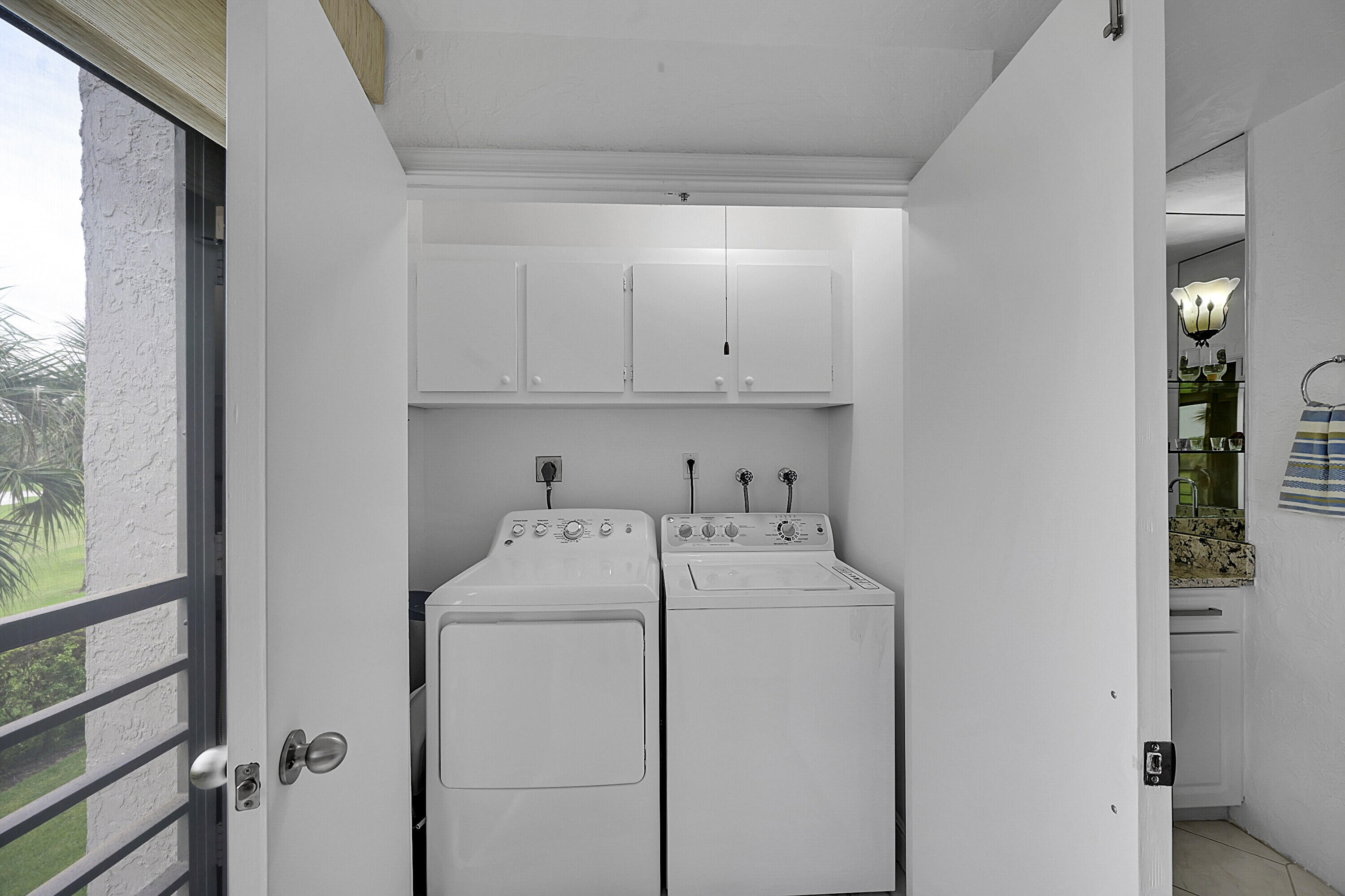 9165 Southwest 14th Street, Unit 1304 Boca Raton, FL 33428 - Photo 28 of 38 Laundry