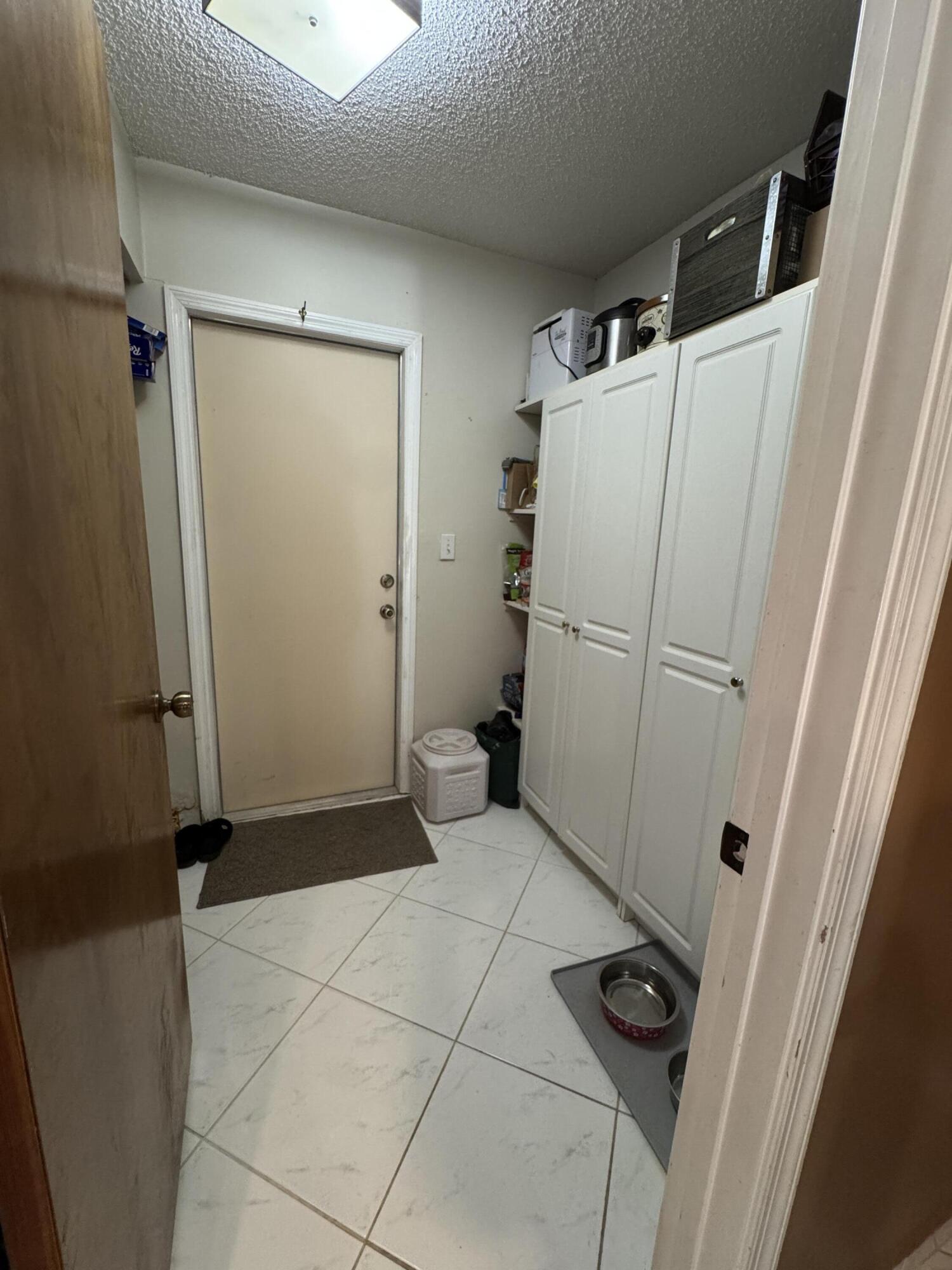 21149 Shady Vista Lane Boca Raton, FL 33428 - Photo 19 of 32 a view of a storage & utility room with a sink