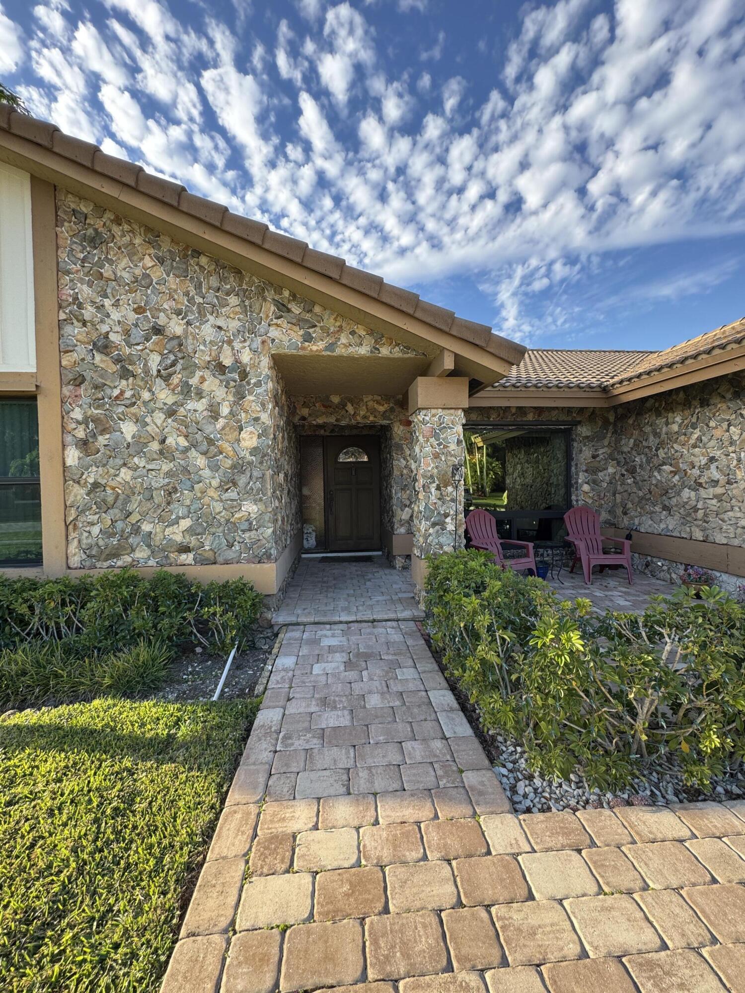 21149 Shady Vista Lane Boca Raton, FL 33428 - Photo 5 of 32 a view of a entryway door of the house