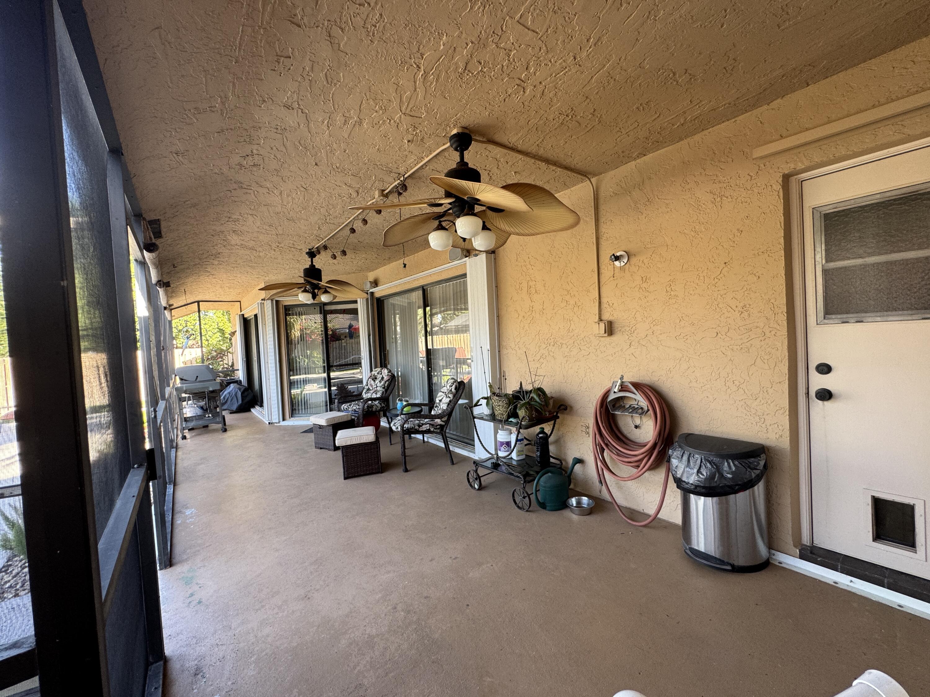 21149 Shady Vista Lane Boca Raton, FL 33428 - Photo 9 of 32 a view of a livingroom with furniture and a window