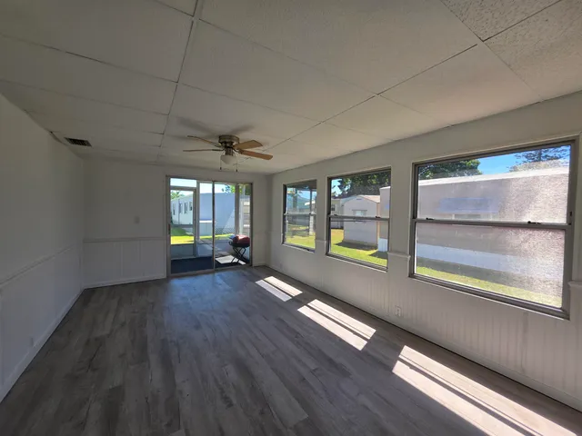 a view of an empty room and window