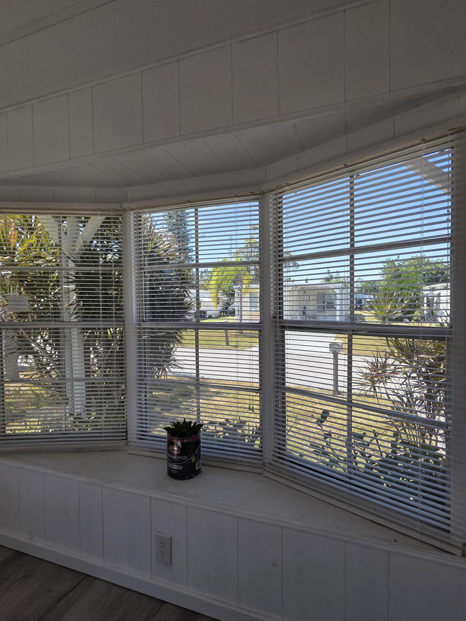 8 Del Sol Port St. Lucie, FL 34952 - Photo 22 of 26 a view of window with an outdoor space