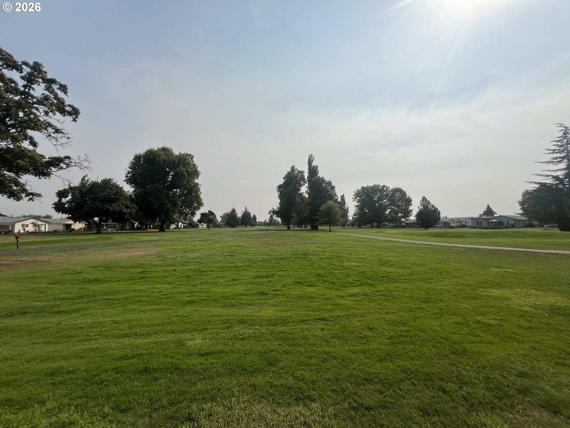 1215 Stanfield Road Woodburn, OR 97071 - Photo 25 of 29 a view of building with outdoor space