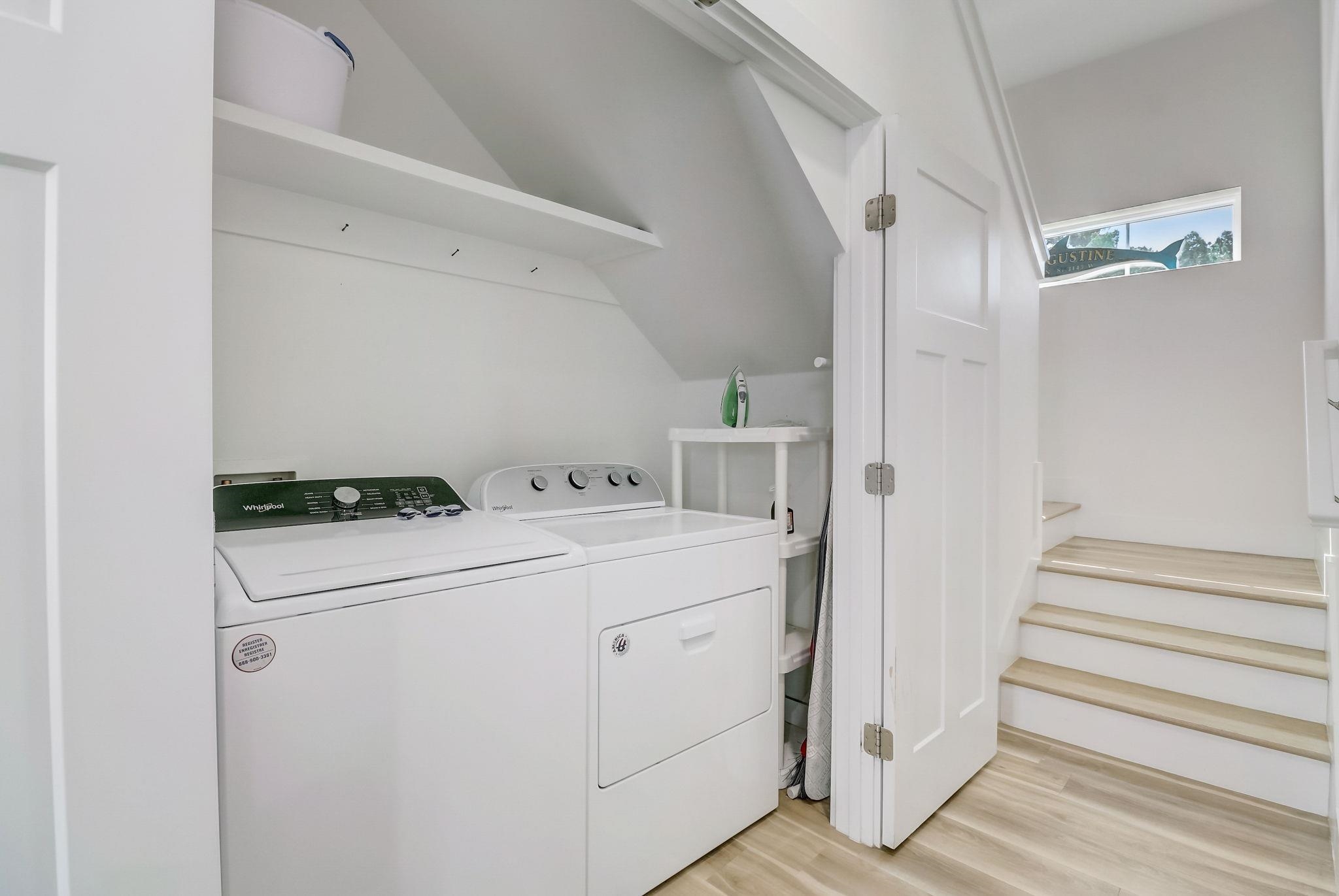 45 Menendez Road St. Augustine, FL 32080 - Photo 19 of 36 a utility room with dryer and washer