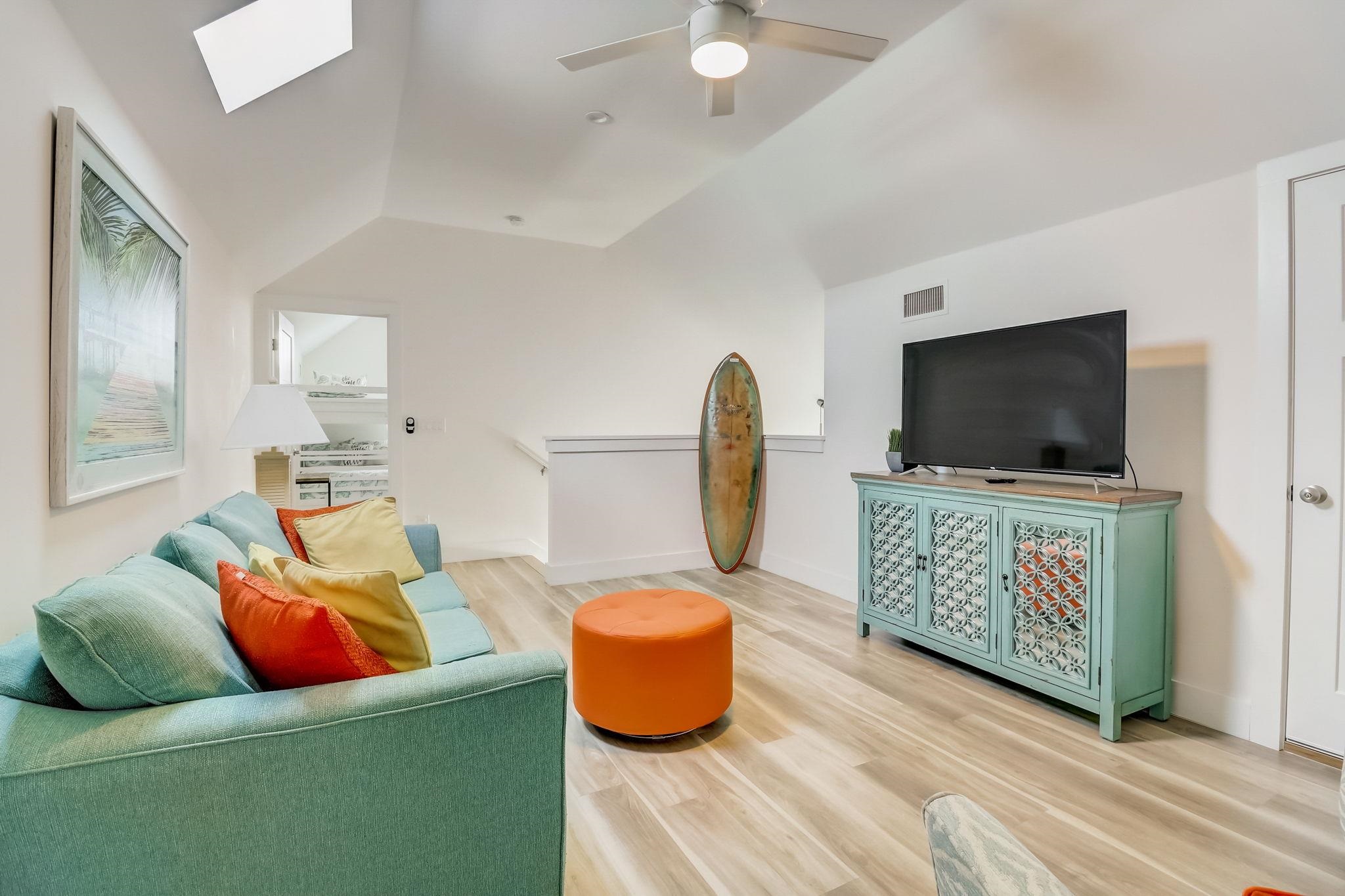 45 Menendez Road St. Augustine, FL 32080 - Photo 22 of 36 a living room with furniture and a flat screen tv