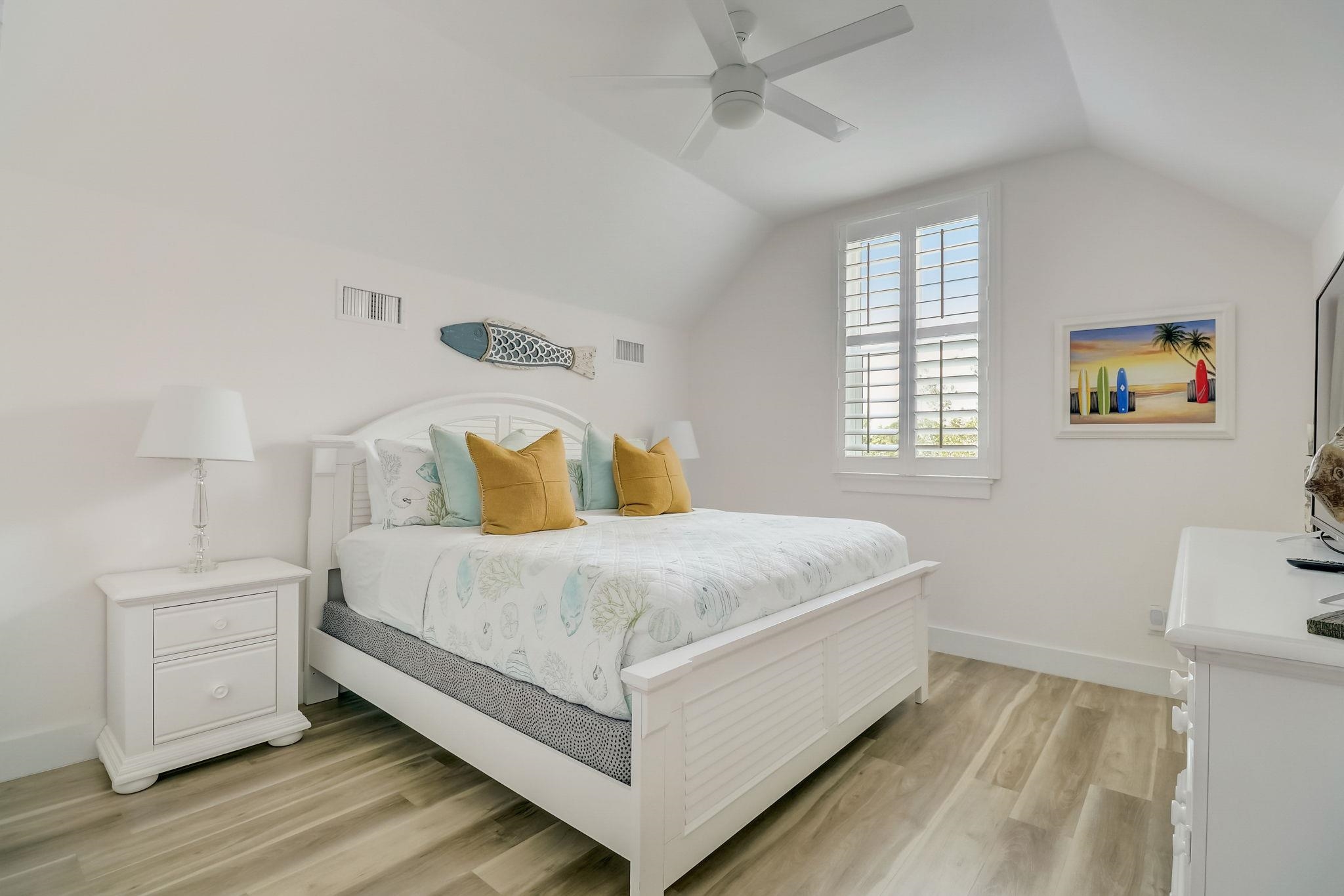 45 Menendez Road St. Augustine, FL 32080 - Photo 23 of 36 a bedroom with a bed and window