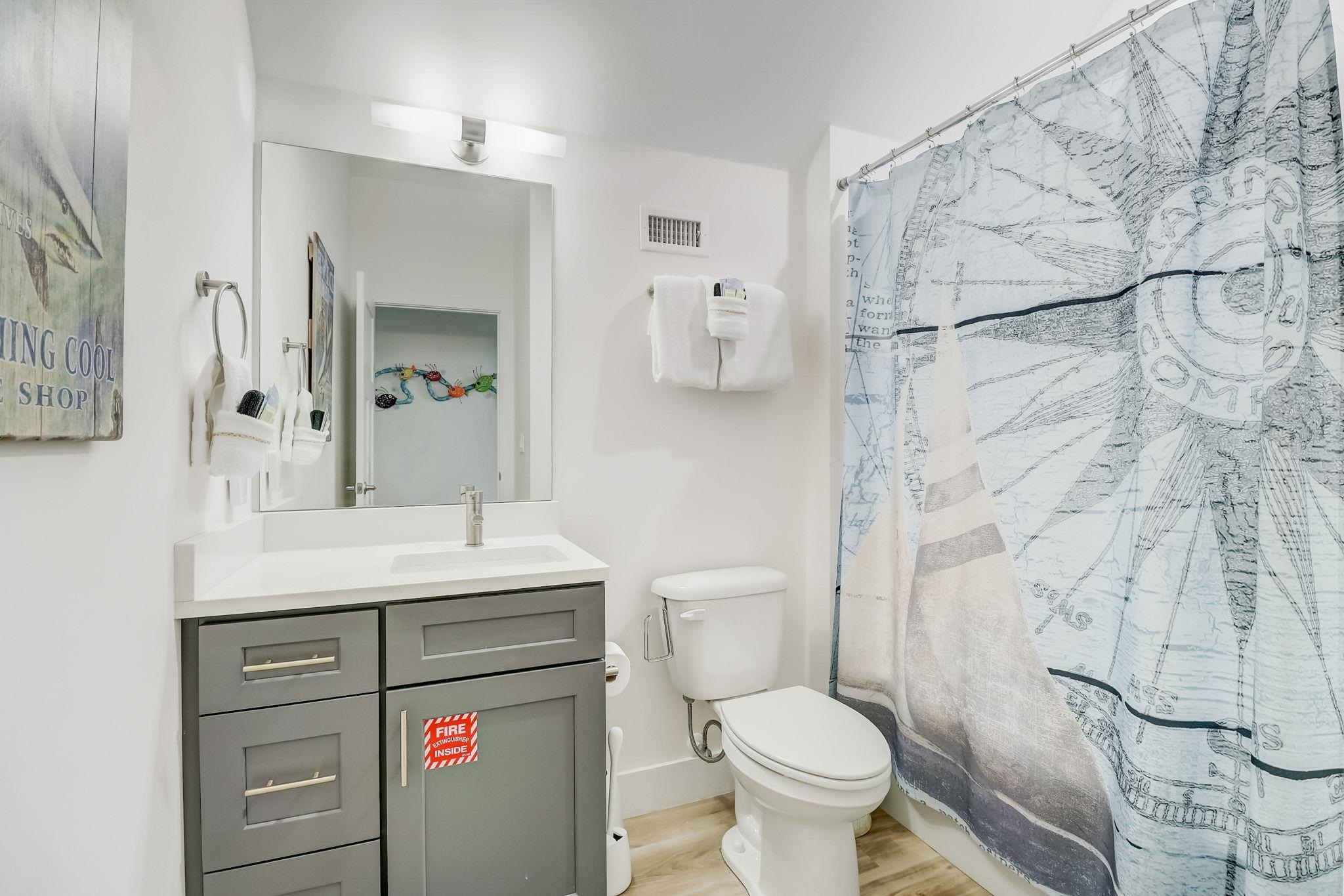 45 Menendez Road St. Augustine, FL 32080 - Photo 25 of 36 a bathroom with a sink toilet and shower