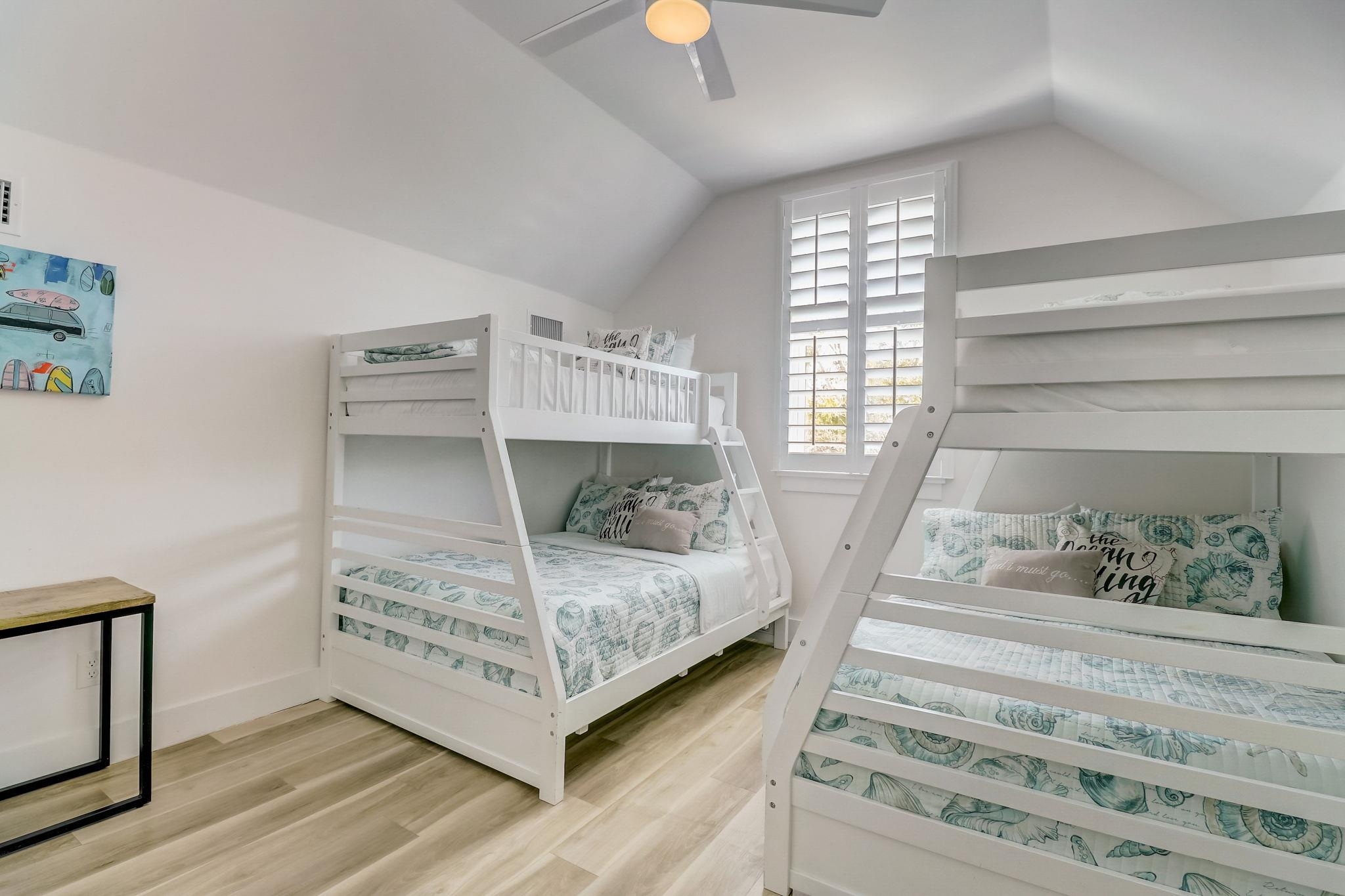 45 Menendez Road St. Augustine, FL 32080 - Photo 27 of 36 a view of a bedroom with baby crib and bedroom