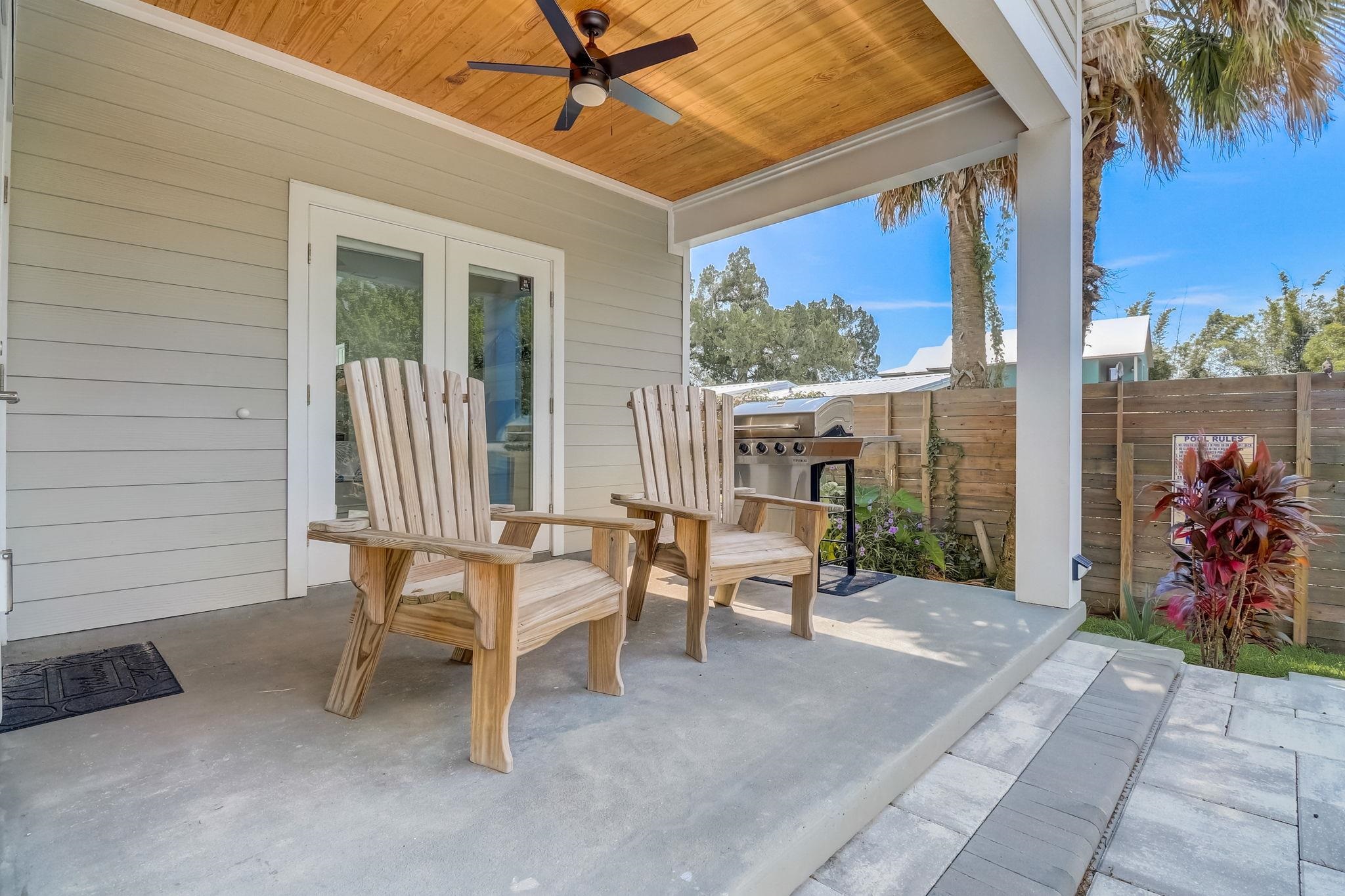 45 Menendez Road St. Augustine, FL 32080 - Photo 28 of 36 a view of a chairs and table in a patio