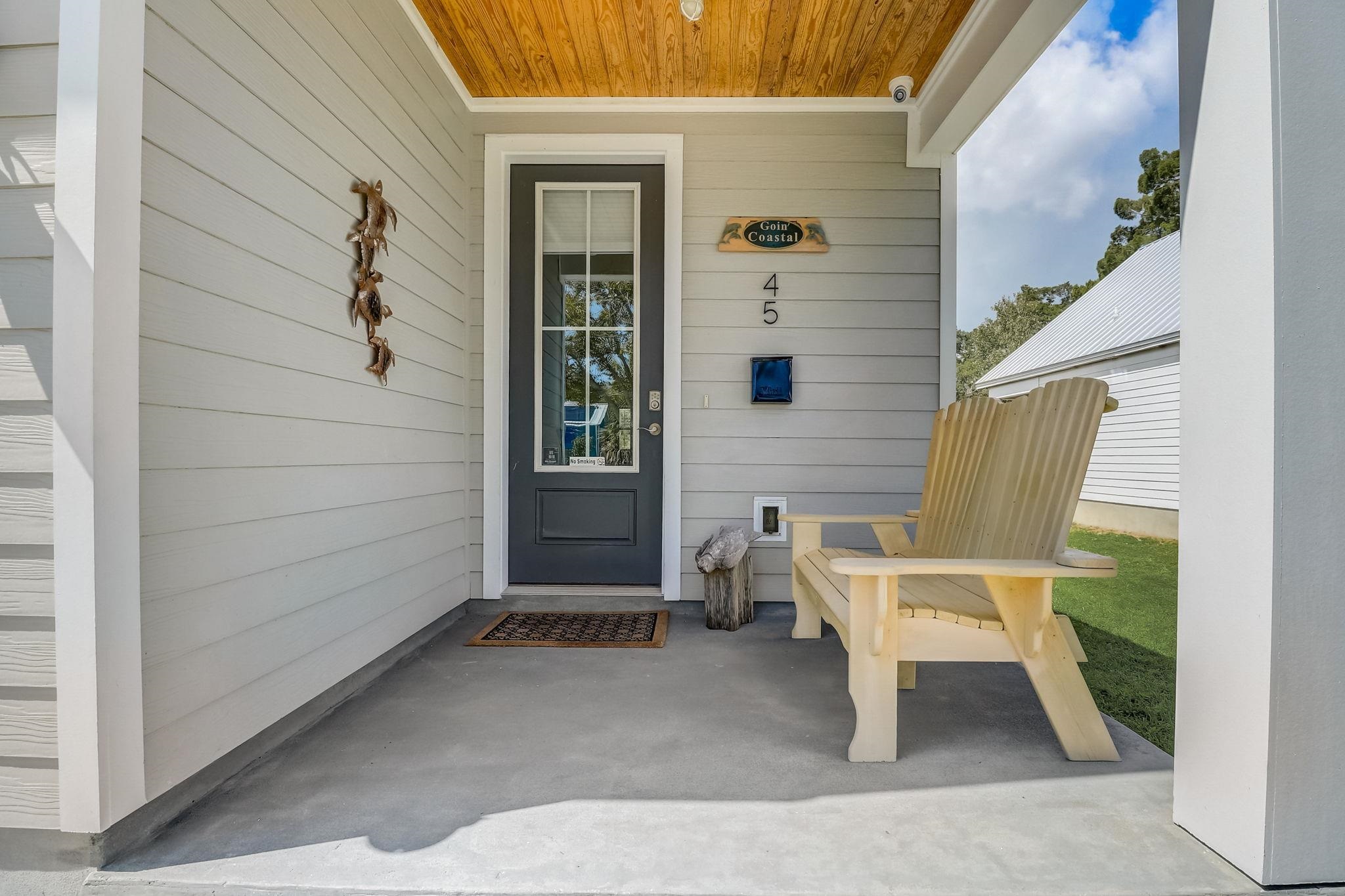 45 Menendez Road St. Augustine, FL 32080 - Photo 4 of 36 a view of wooden bench in backyard of a house