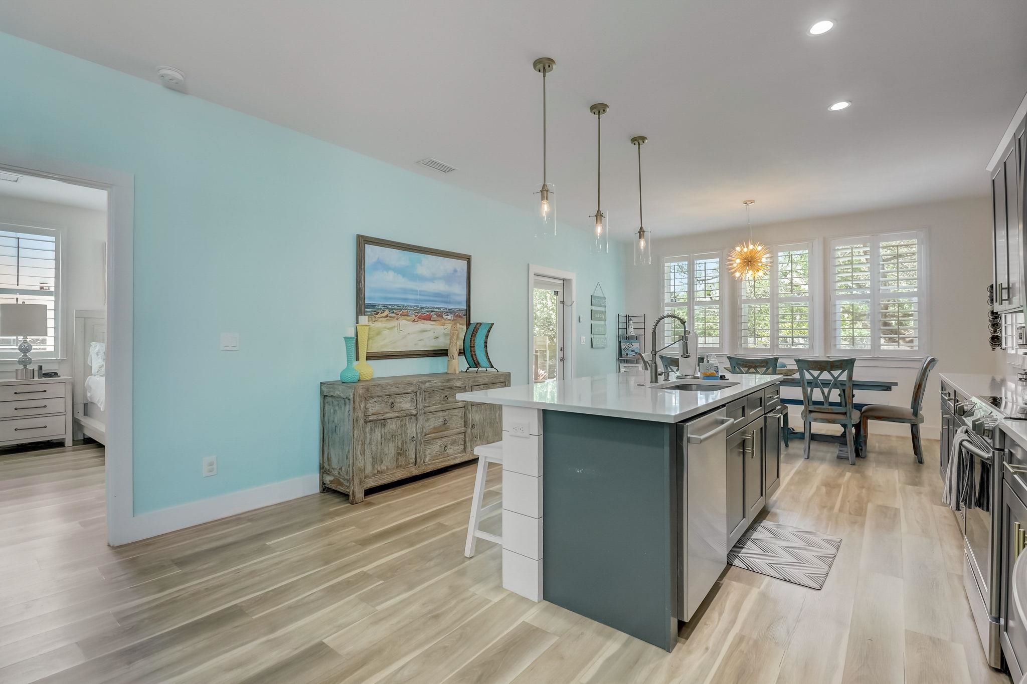 45 Menendez Road St. Augustine, FL 32080 - Photo 9 of 36 a kitchen with furniture and wooden floor
