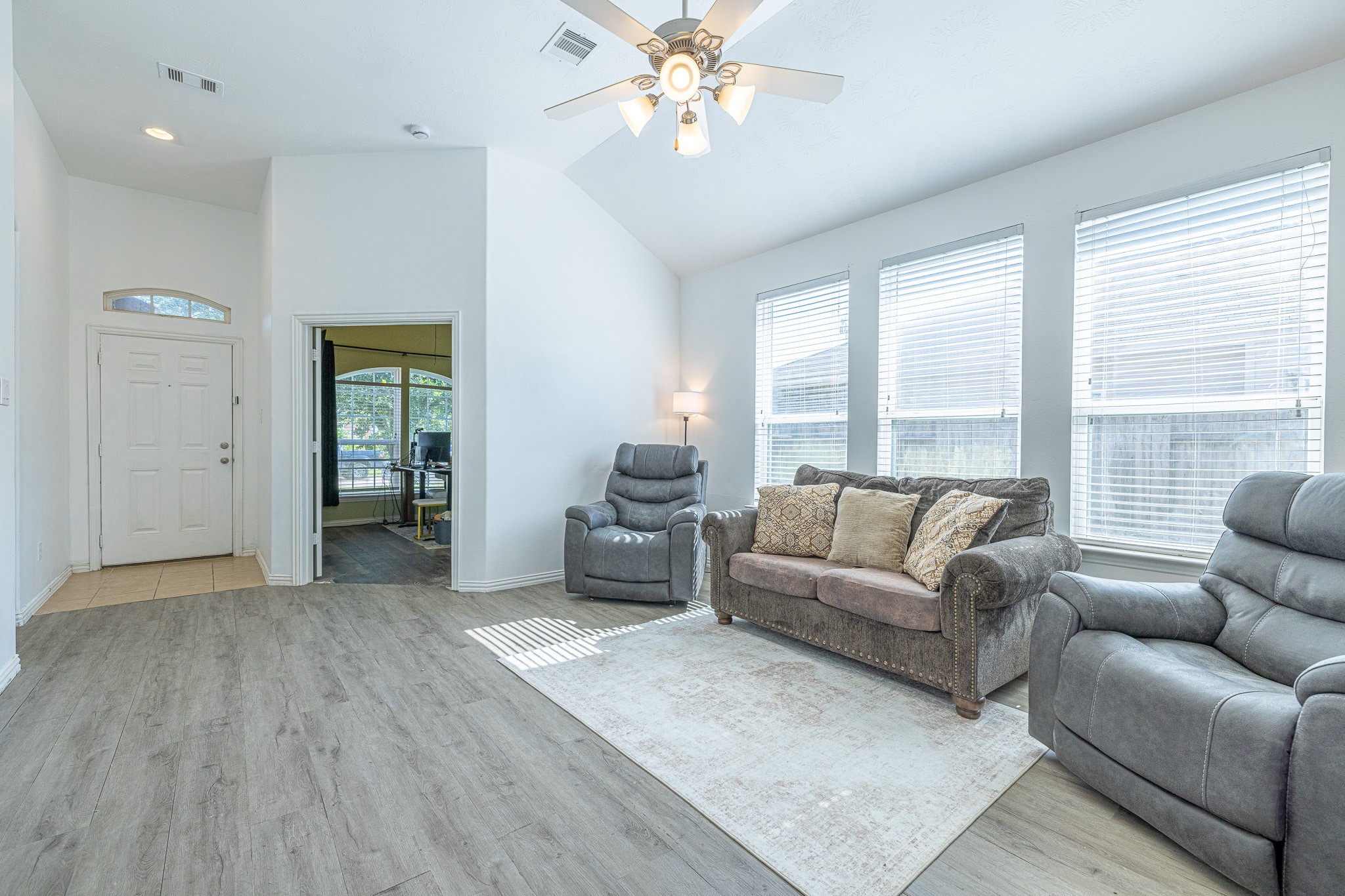 3818 Hunters Trail Baytown, TX 77521 - Photo 8 of 32 a living room with furniture and a large window
