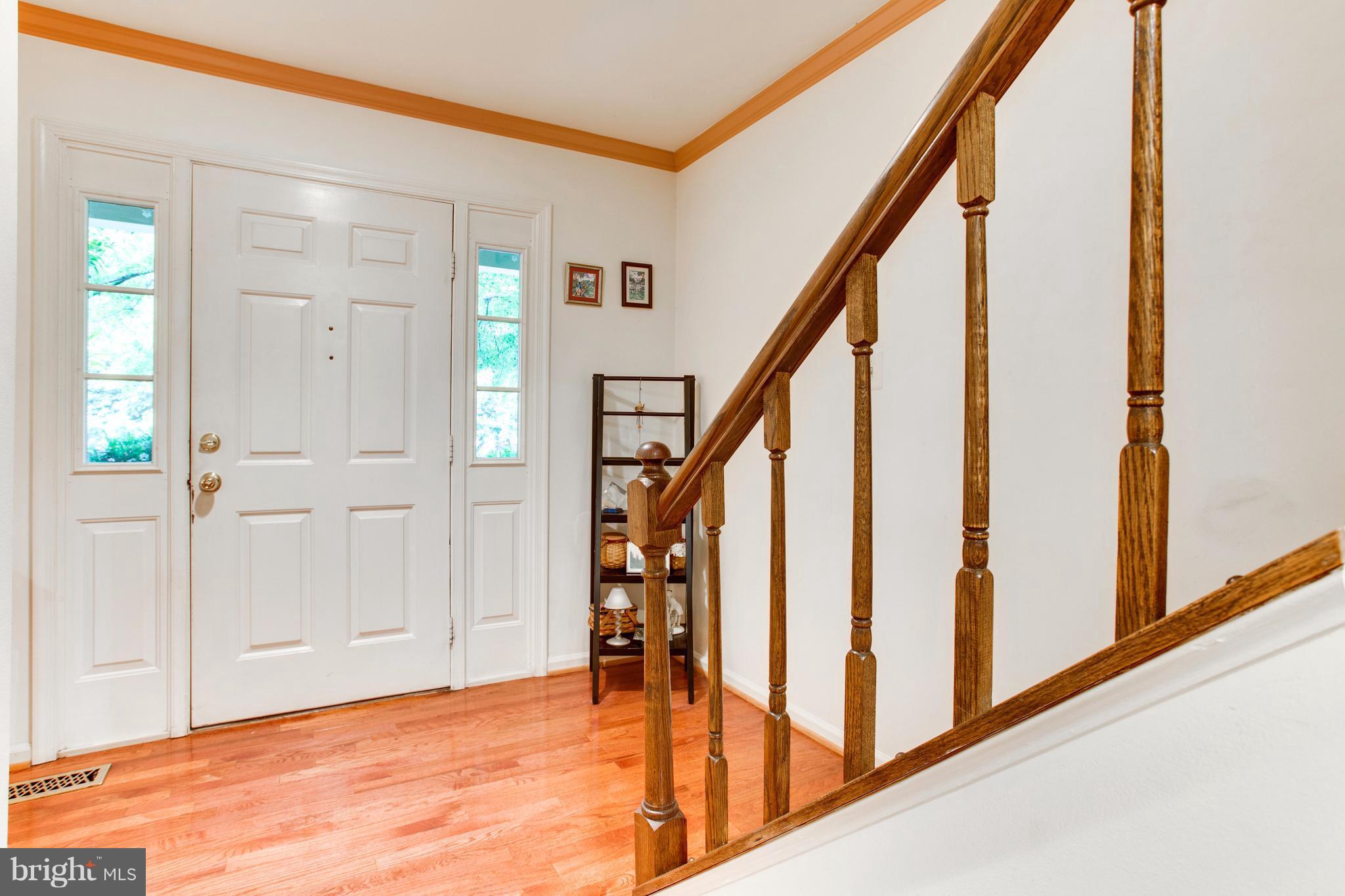 5806 Stone Ridge Drive Centreville, VA 20120 - Photo 3 of 26 Elegant hardwood floors on main level