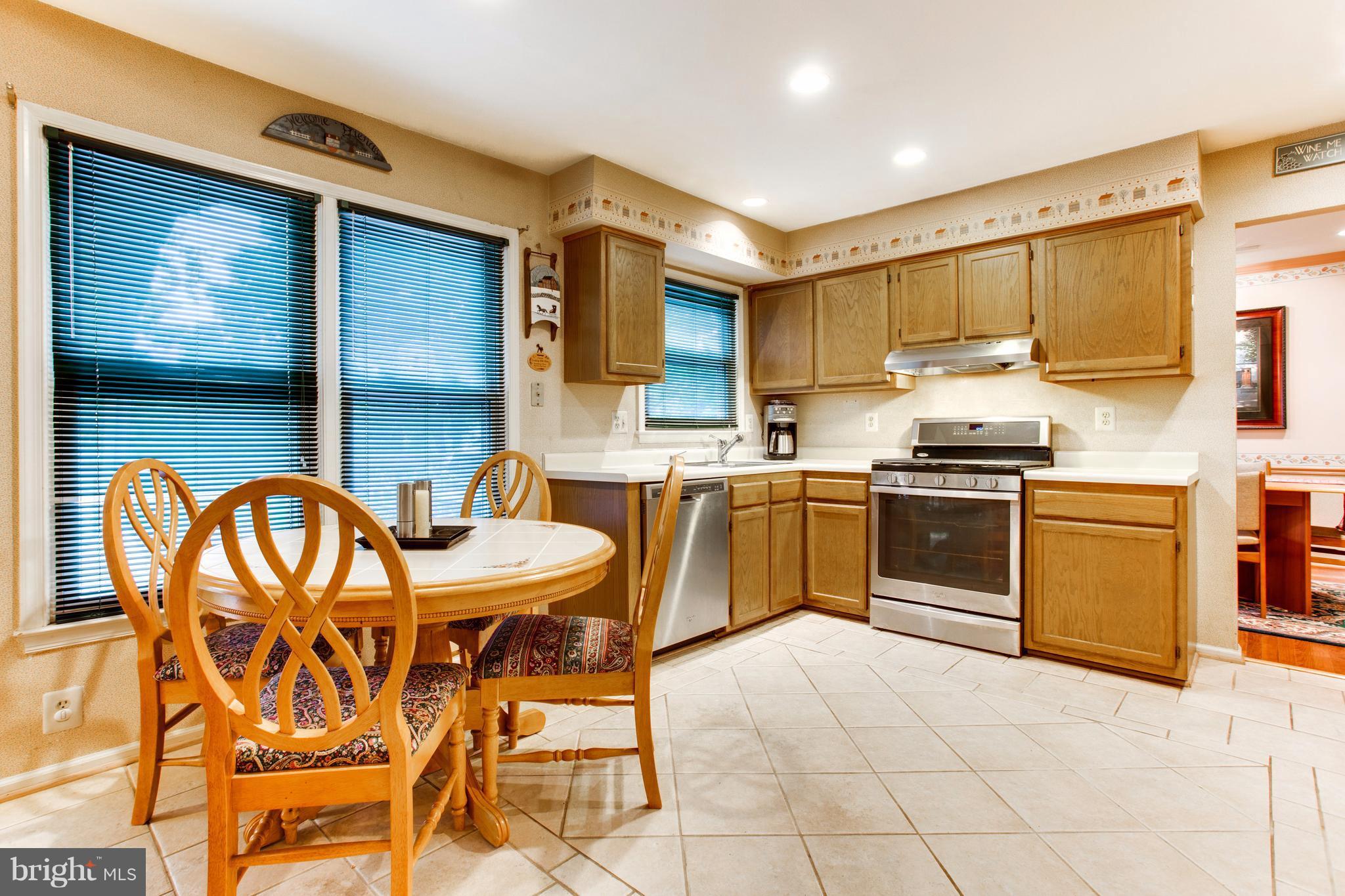5806 Stone Ridge Drive Centreville, VA 20120 - Photo 8 of 26 Upscale tile floor & SS appliances