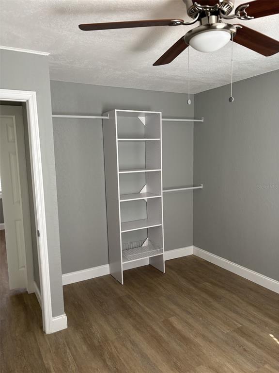 316 Brooks Road Frostproof, FL 33843 - Photo 8 of 11 a view of an empty room with a window and wooden floor