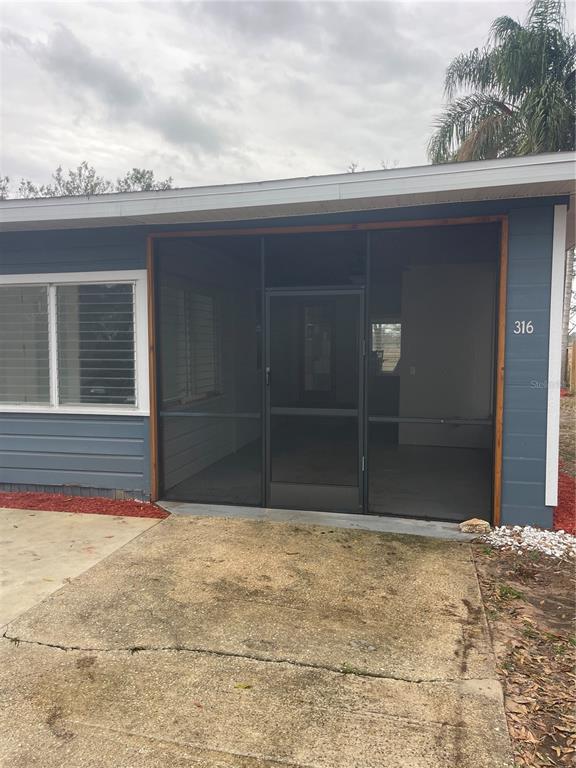316 Brooks Road Frostproof, FL 33843 - Photo 10 of 11 a view of front door