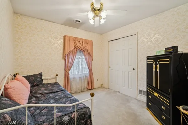 a view of room with wooden floor