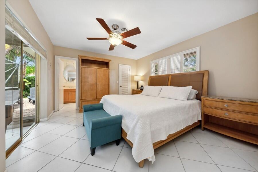 555 Southwest 8th Terrace Boca Raton, FL 33486 - Photo 21 of 43 24_555SW8thTerrace_14_PrimaryBedroom_Low