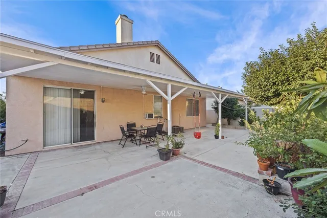 a front view of a house with patio