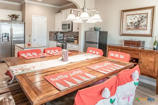 a bedroom with a bed and a table