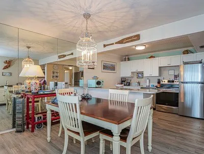 a spacious bedroom with a bed and ceiling fan
