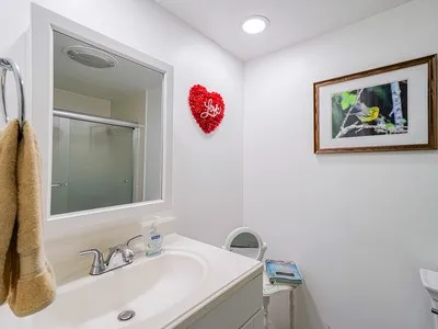 a view of a living room and a floor to ceiling window